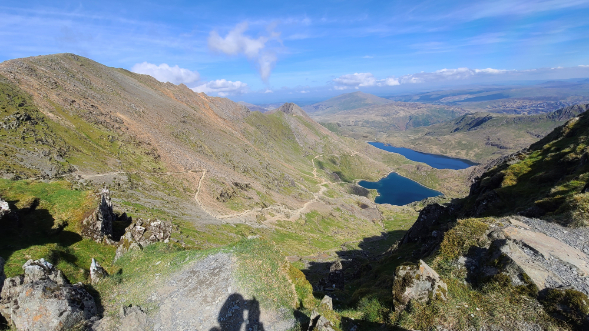 20240509_154156 Looking down on the Pyg Track from the summit of Y Wyddfa on a clear sunny day.