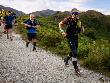 On the Walna Scar Road at the start of the Lakeland 100 race in 2026. Running along a stony path with other athletes behind me.