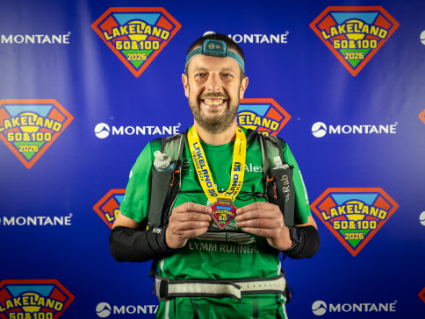 Alex at the finish with his medal